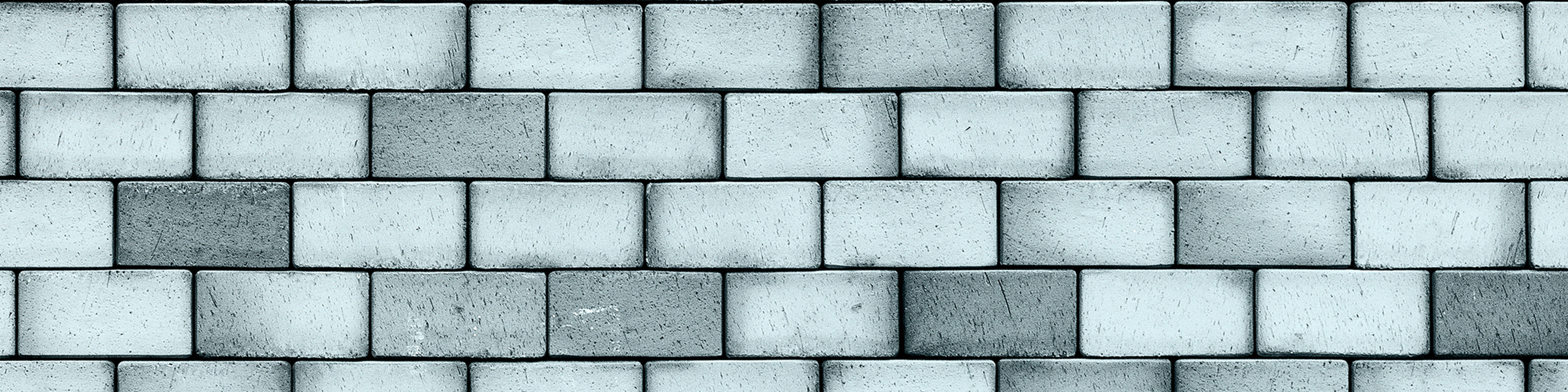 Mur z szarych i białych cegieł w stylu loft